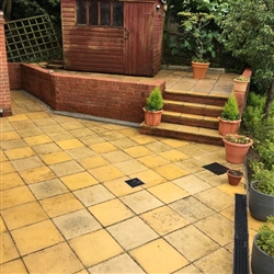 Pressure washing a patio area. Customer didn't realise that the slabs were yellow.